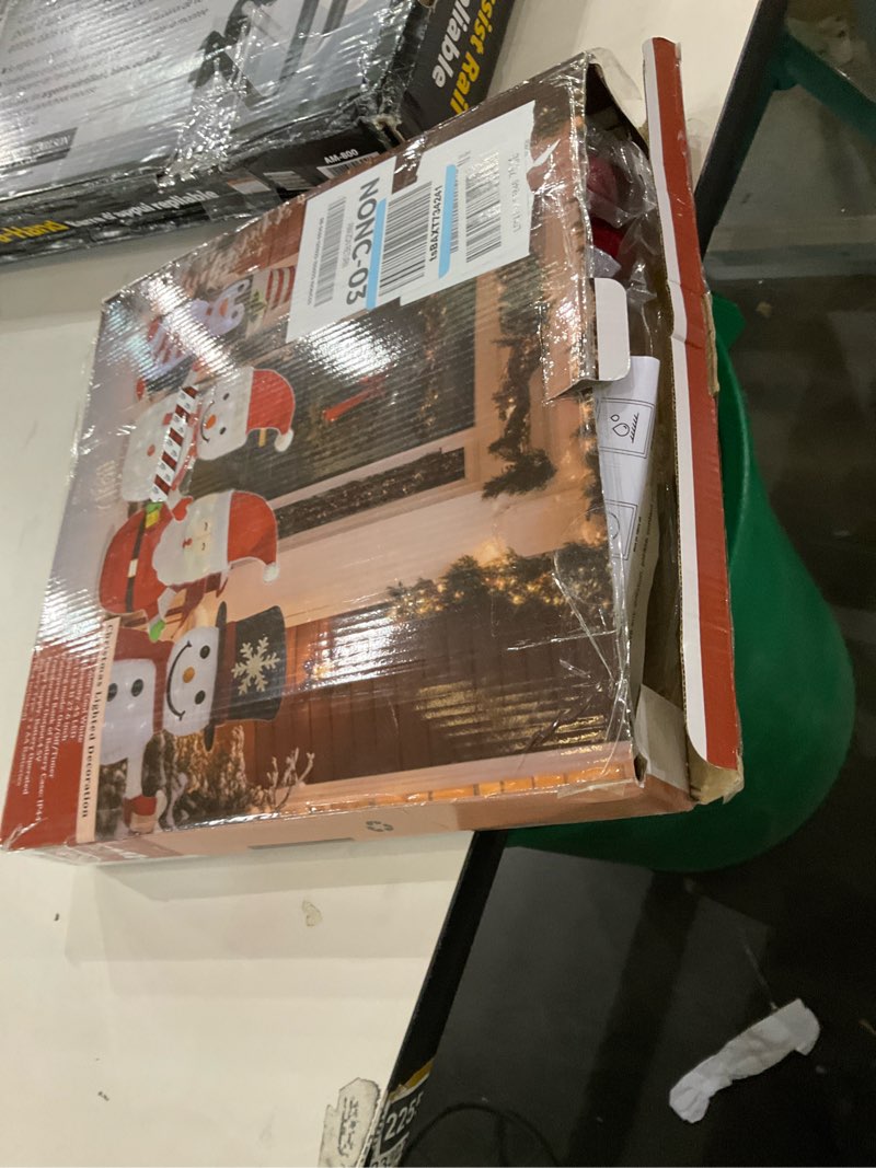 Condition photo showing As Is for Christmas Standing Light-Up Snowman Decoration Features a Santa hat and Gift Box, Battery Operated Light-Up Christmas Decorations for porches, lawns, Yards, Indoor and Outdoor (2.75 Ft) Snowman with Box