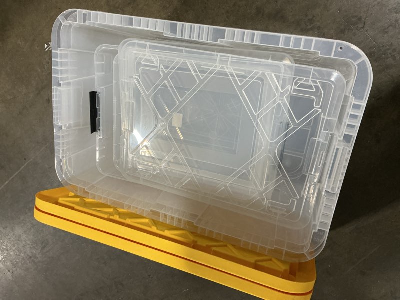 Condition photo showing Good Condition for 4 assorted storage containers with lids