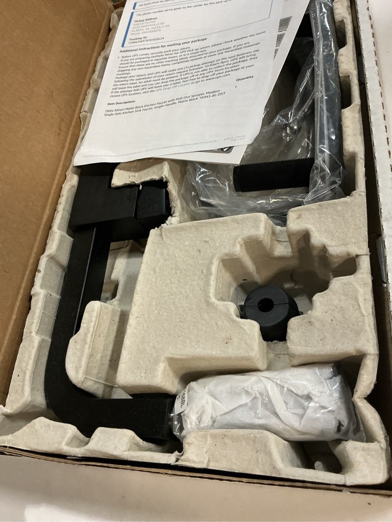 Condition photo showing As Is for delta almari matte black kitchen faucet with pull-out sprayer, modern single hole kitchen sink, single handle, matte black 16943-bl-dst