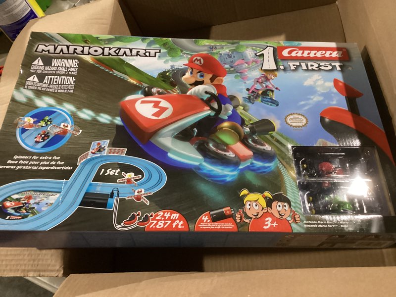Condition photo showing Good Condition for carrera first mario kart - slot car race track with spinners includes 2 cars: and yoshi battery-powered beginner racing set for kids ages 3 years up