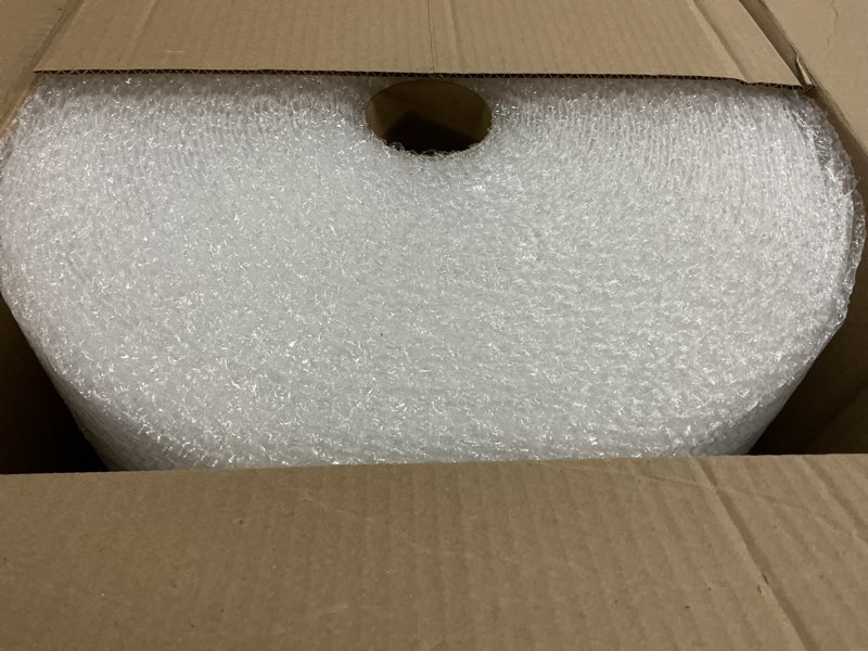Condition photo showing New/Like New for amazon basics bubble wrap for moving, packing, shipping and storage, perforated protective cushioning for fragile items, 12-inch x 175-ft long roll, small 3/16", clear