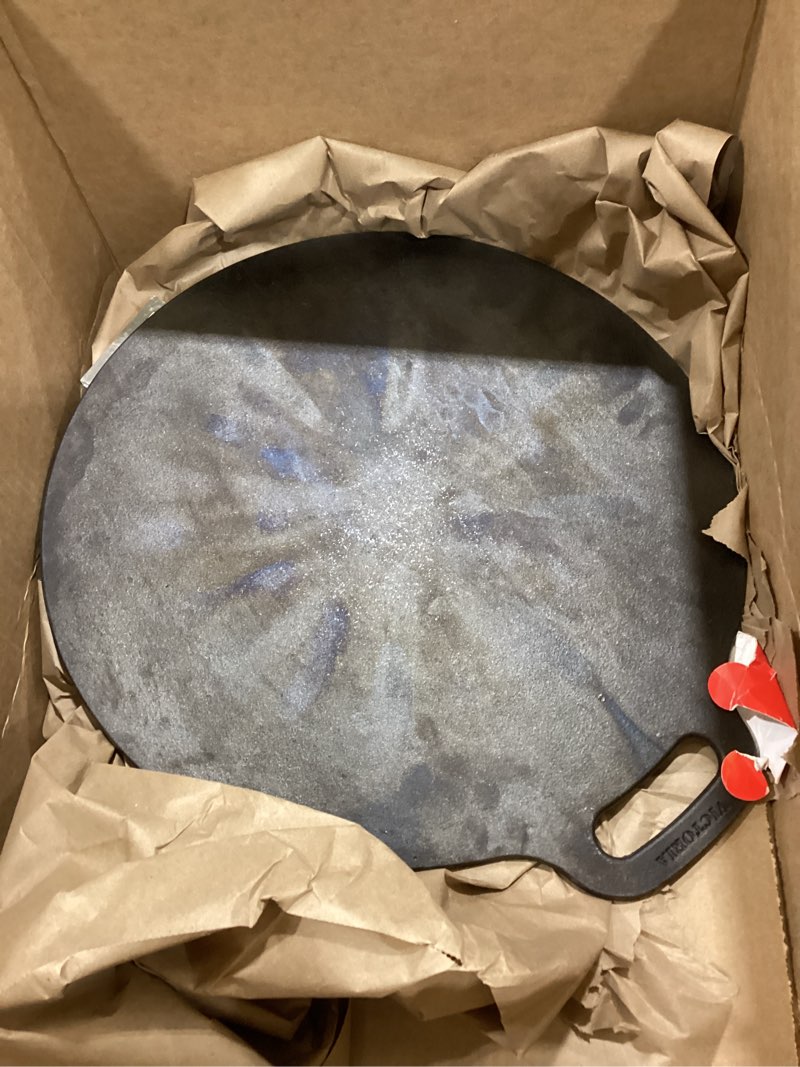 Condition photo showing As Is for victoria 15-inch cast iron tawa dosa pan, pizza pan with a loop handle, crepe tawa preseasoned with flaxseed oil, made in colombia 15 inch pan