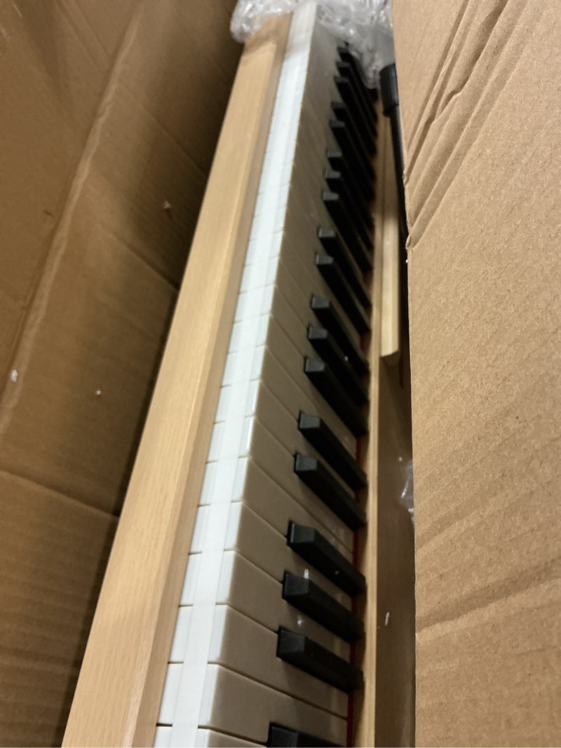 Condition photo showing Good Condition for 88 Key Digital Piano Keyboard,88 Key Full Size Weighted Hammer Action Electric Keyboard Piano with 200 Rhythms,200 Tones, Piano Keyboard with Stand, TriplePedal,Headphone, Carrying Bag Yellow