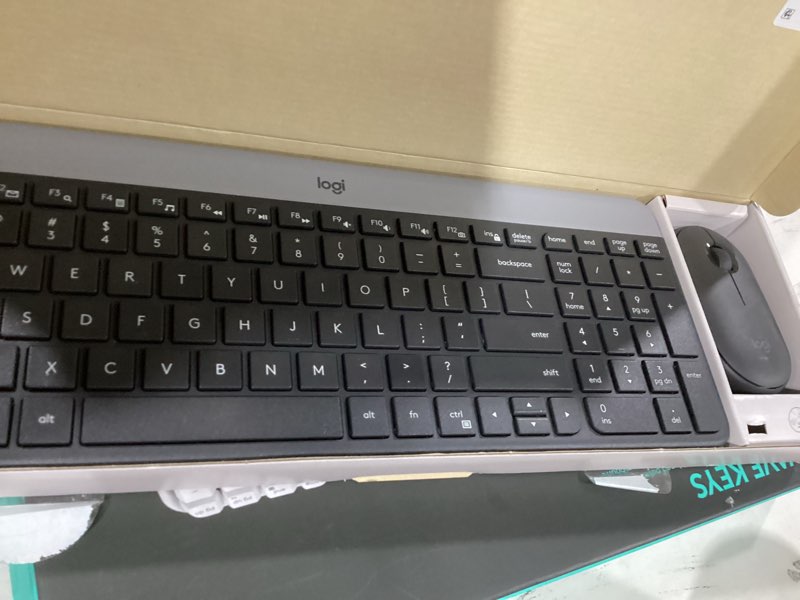 Condition photo showing As Is for Logitech MK955 Signature Slim Wireless Keyboard and Mouse Combo, for Larger Hands, Quiet Typing and Clicking, Switch Across Three Devices, Bluetooth, Multi-OS, for Windows and Mac Graphite Battery Powered Combo