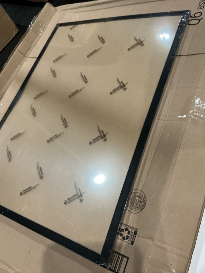 Condition photo showing New/Like New for unknown brand. 21x29 black picture frame for puzzles posters photos or artwork