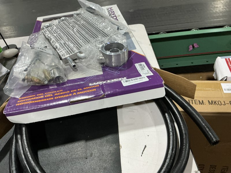 Condition photo showing As Is for (missing hardware)hayden automotive 459 ultra-cool engine oil cooler kit