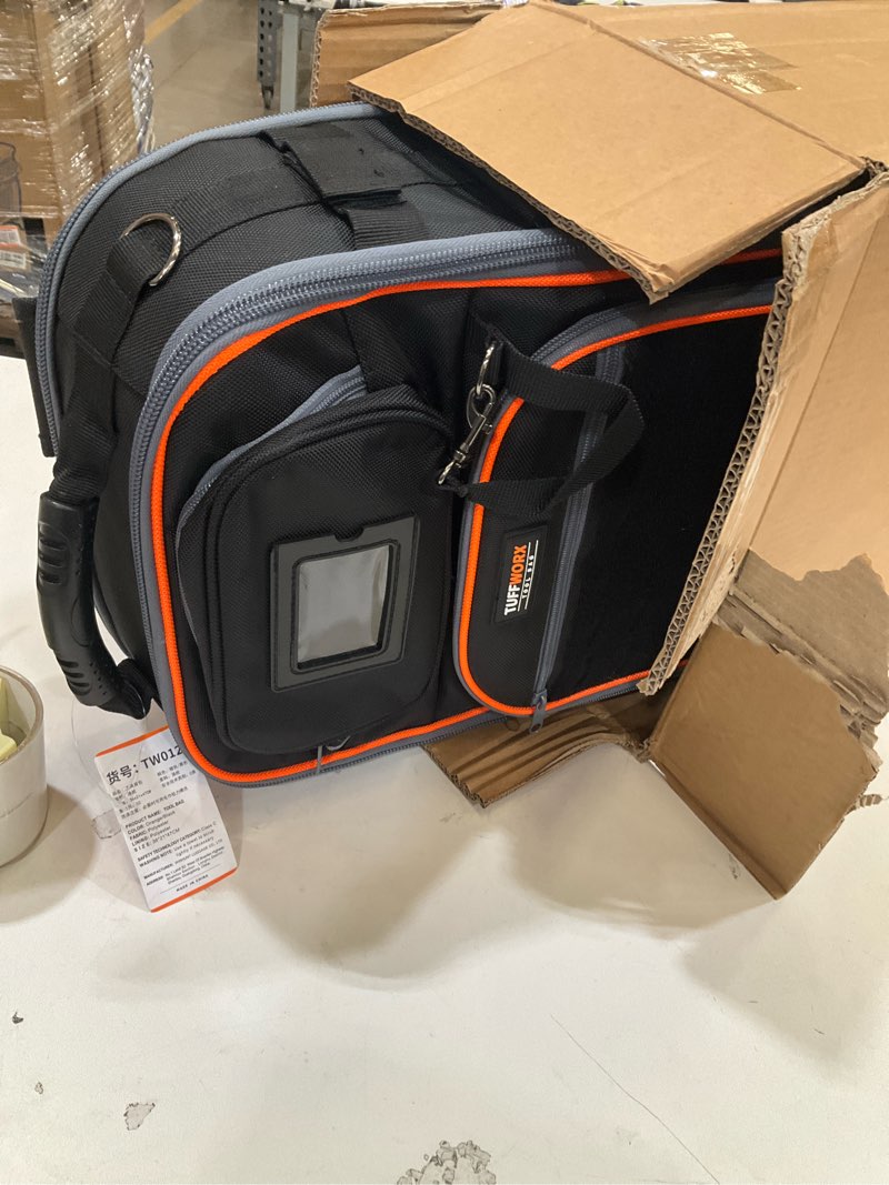 Condition photo showing Good Condition for tool backpack, 35 pockets, 18.5 x 13.7 x 7.8 inches, black and orange, water-repellent