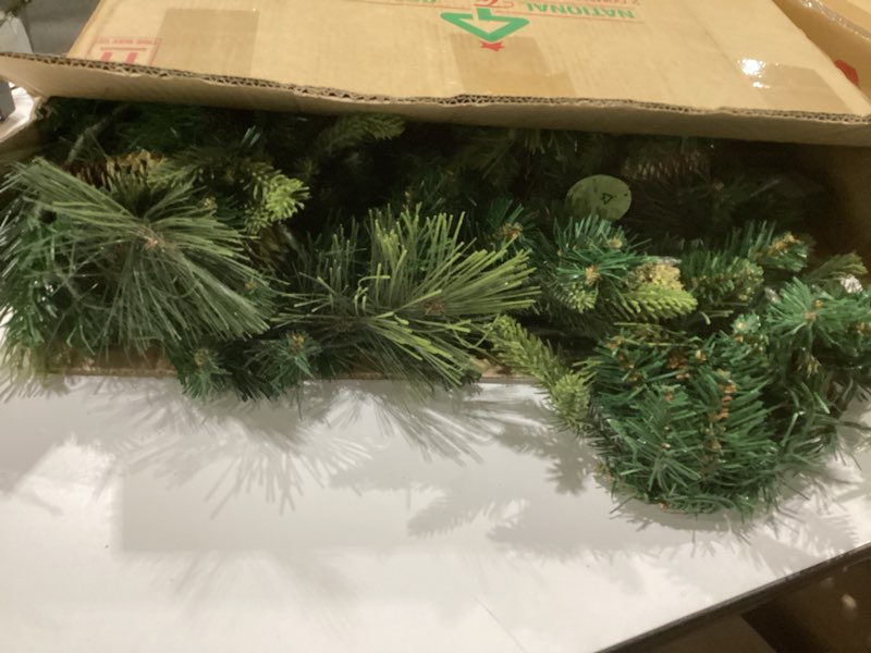 Condition photo showing Good Condition for national tree company 9 ft pre-lit carolina pine artificial christmas garland, christmas decoration with pinecones, 100 warm white led lights, 240 tips, timer, green battery operated tree
