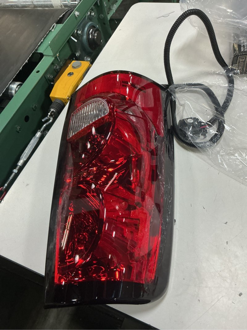Condition photo showing As Is for 1500 tail light 2004 2005 2006 driver side capa certified gm2800174 - 19169004 ;fleetside