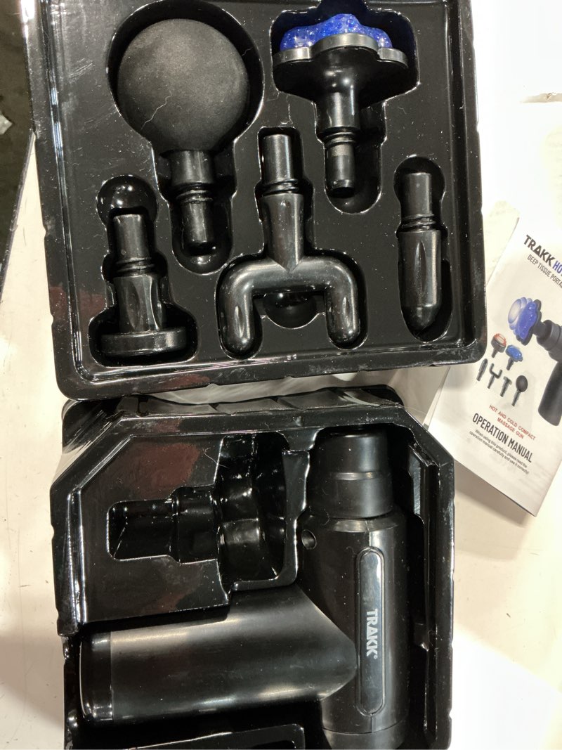 Condition photo showing As Is for trakk compact hot & cold massage gun - 6 interchangable heads