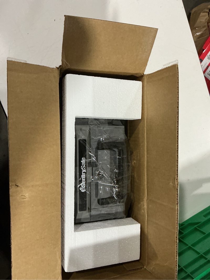 Condition photo showing Good Condition for sentrysafe fireproof safe box with key lock, chest safe with carrying handle to secure money, jewelry, documents, 0.25 cubic feet, 6.3 x 15.3 x 12.1 inches, 1160