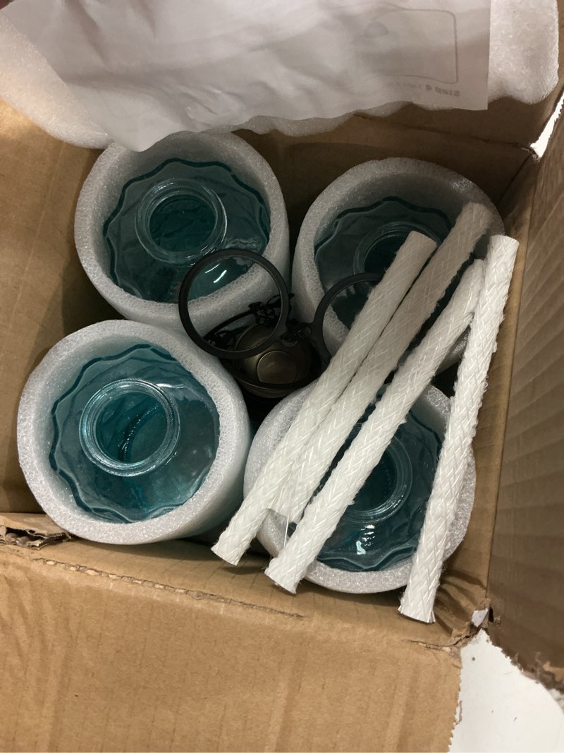 Condition photo showing New/Like New for nonley glass table top torches, 4 pack citronella torches for outside, 12oz flame light torch,refillable, wick and cap included, landscape lanterns torches for garden yard patio party decor blue