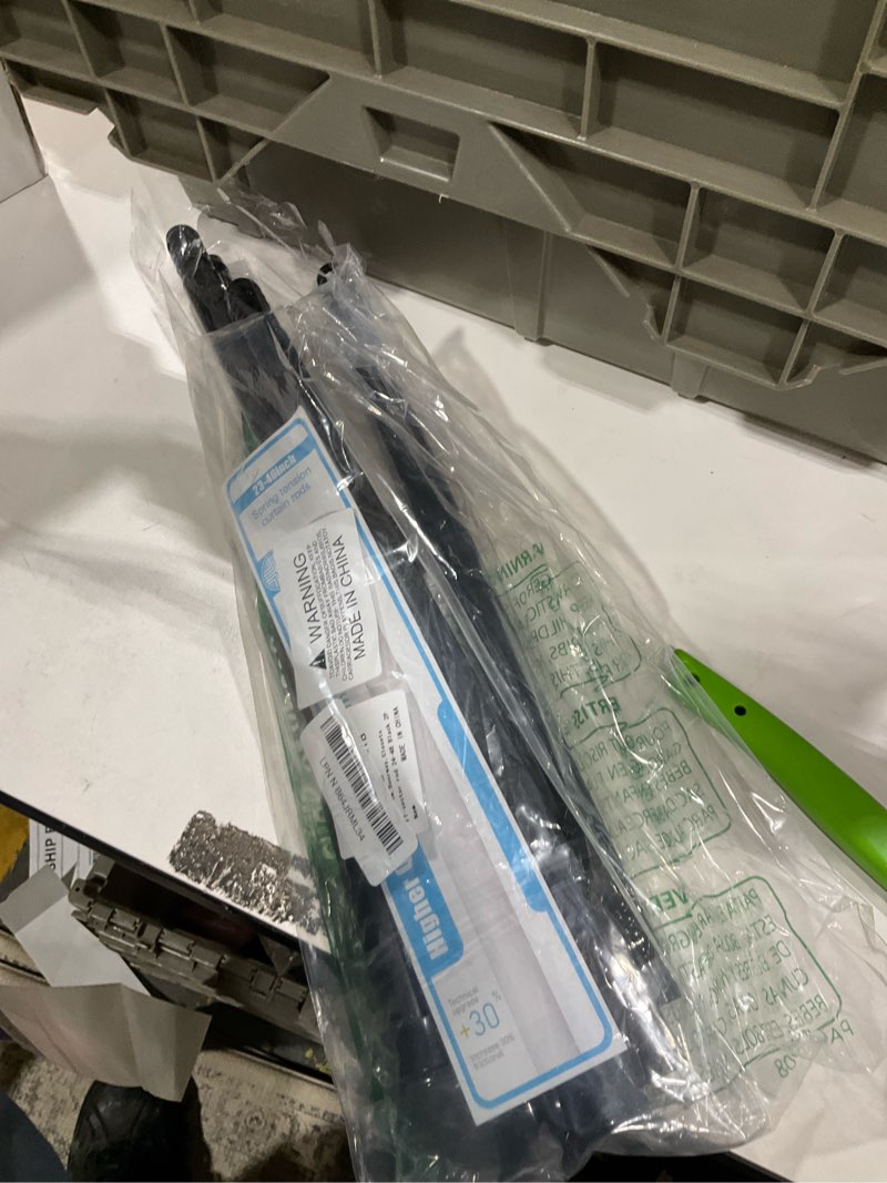 Condition photo showing As Is for 2Pack Tension Rod 24-48Inch Black Curtain Rods for Windows Spring Adjustable Curtain Rods no Drilling Tension Curtain Rods for Window,Doorway,Closets 24? to 48? 2P Black