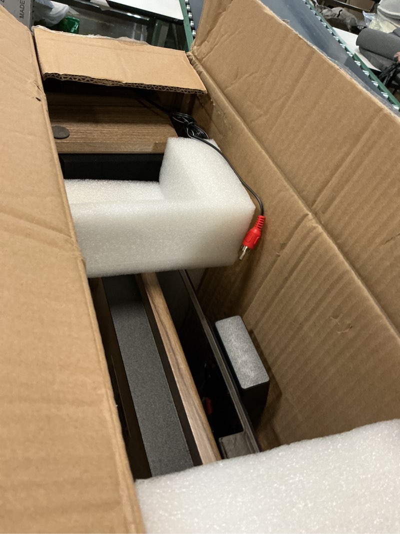 Condition photo showing As Is for Victrola Montauk Vinyl Record Player, 3-Speed Belt Driven Turntable with Stereo Bluetooth Speaker Pair, RCA Output and 3.5mm Headphone Jack, Removable Dust Cover, Farmhouse Walnut Finish Farmhouse Walnut System