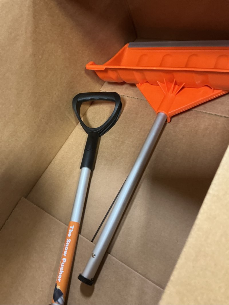 Condition photo showing As Is for Snow Pusher, 24-inch Wide Snow Shovel for Driveway, Snow Removal Tool for Car Garage, Sidewalks and Doorways, Snow Pusher Shovel with Ergonomic Grip and Aluminum Strip, Orange