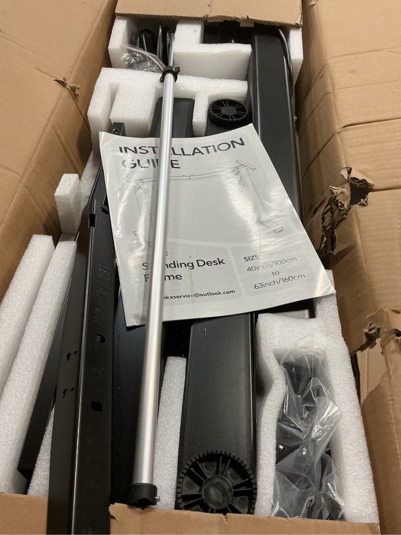 Condition photo showing As Is for Claiks Standing Desk Frame, Electric Stand Up Desk Legs Frame Workstation Up to 63",T-Shaped Adjustable Standing Computer Desk for Home and Office, (Black Frame only)