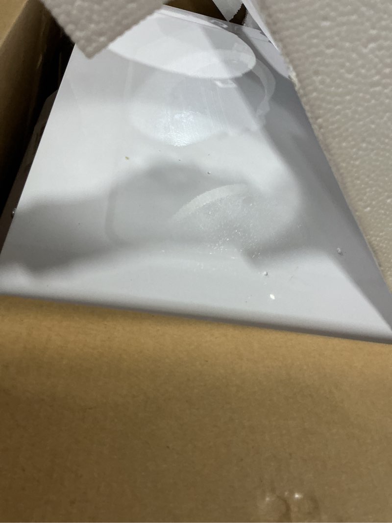 Condition photo showing As Is for 0.9 cu. ft. 900 watt countertop microwave in white