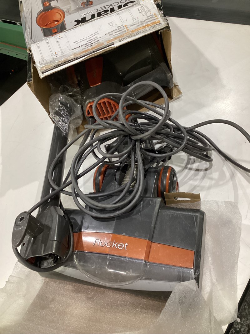 Condition photo showing As Is for ( USED, NOT TESTED) Shark Rocket Ultra-Light Corded Bagless Vacuum for Carpet and Hard Floor Cleaning with Swivel Steering (HV301), Gray/Orange