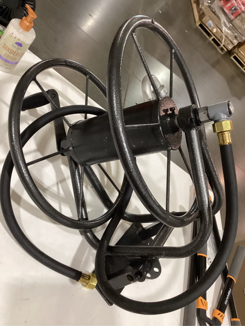 Condition photo showing As Is for project source steel 125-ft wall-mount hose reel