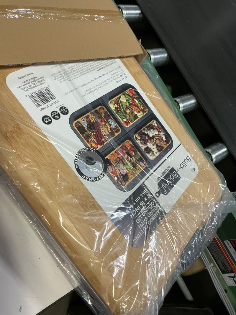 Condition photo showing New/Like New for Farberware 12"x16" Build-a-Board Charcuterie 3 pocket Bamboo Board with Locking Lid/ Black Handle
