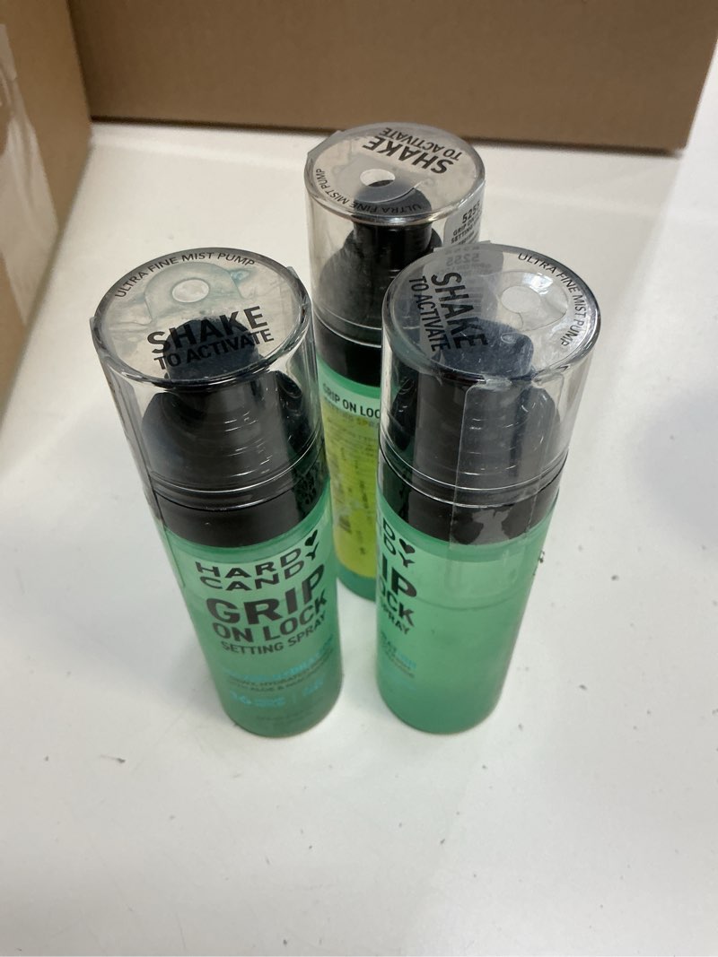 Condition photo showing Good Condition for hard candy grip on lock setting spray  alcohol-free  16 hour hold  dewy finish  hydrating ( 3 bottle )