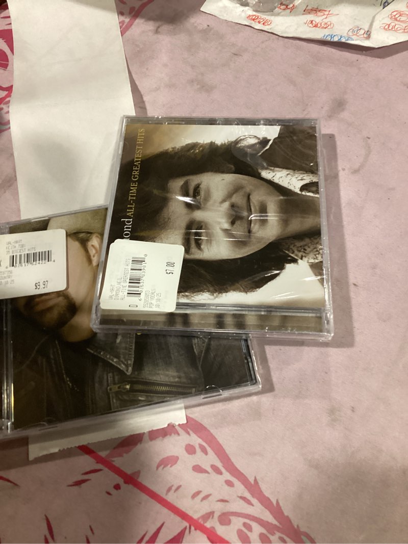 Condition photo showing New/Like New for assorted music cd’s
