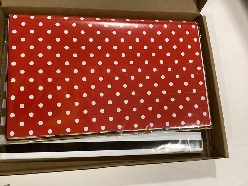 Condition photo showing As Is for AmazingSpark 12 Sheets Christmas Wrapping Paper 20x27inch Cartoon Mouse Gift Wrapping Folded Red Black Yellow Christmas Tissue Papers for All Occasions Birthday Holiday Xmas Party Gift Decoration