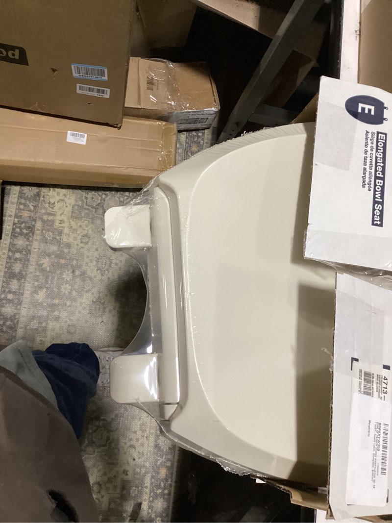 Condition photo showing New/Like New for kohler french curve ready latch quiet-close elongated toilet seat contemporary biscuit elongated