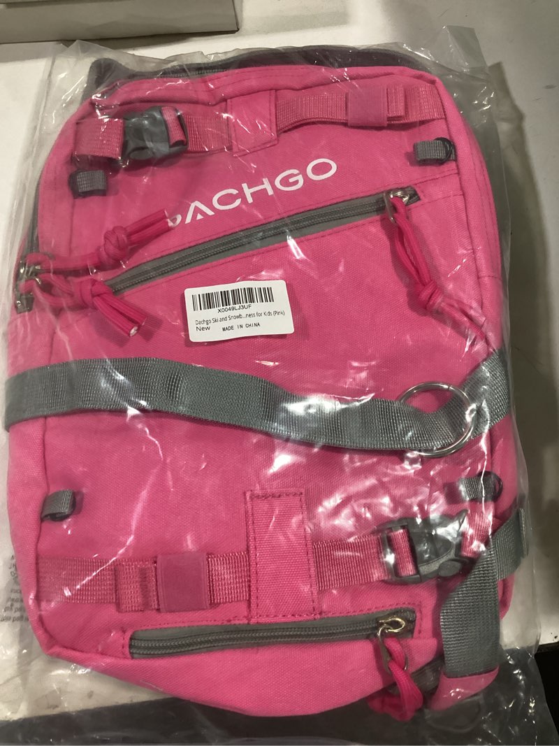 Condition photo showing New/Like New for Ski and Snowboard Harness with Training Leash for Kids - Teach Your Child The Fundamentals of Skiing or Snowboarding Pink Backpack with Traning Leash