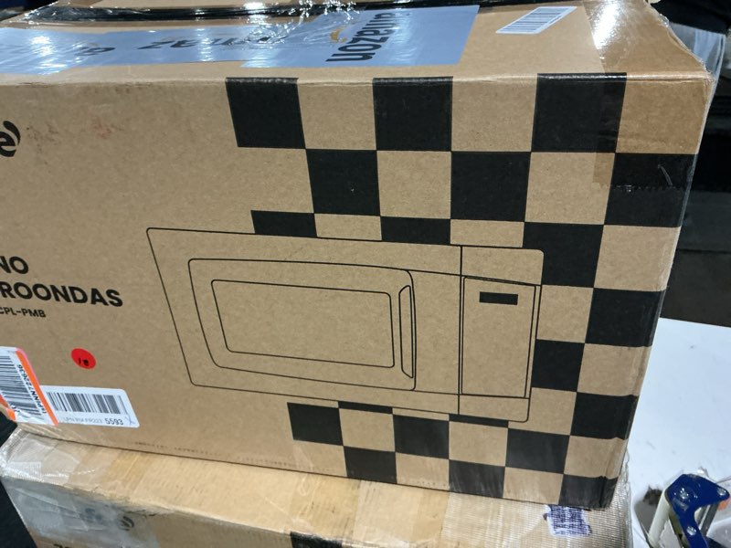 Condition photo showing As Is for comfee' em720cpl-pmb countertop microwave oven with sound on/off, eco mode and easy one-touch buttons, 0.7cu.ft, 700w, black