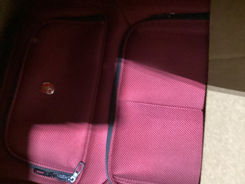Condition photo showing As Is for luggage