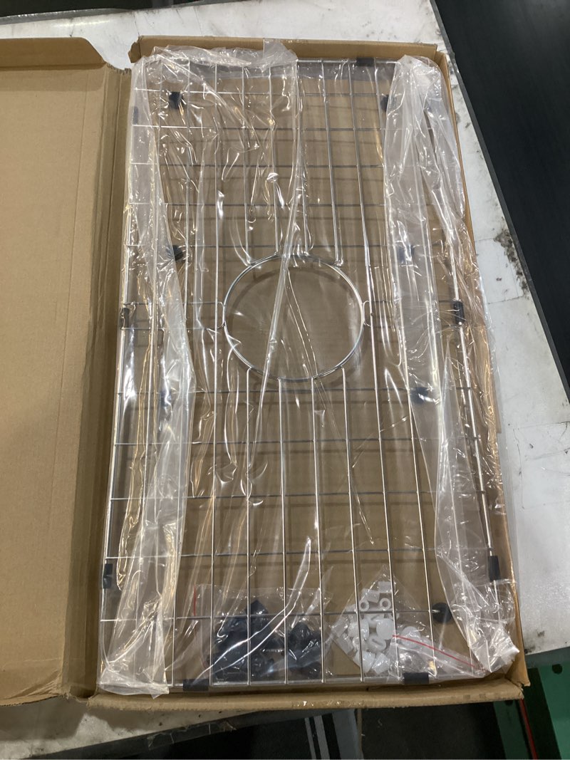 Condition photo showing New/Like New for Serene Valley 25-1/8" x 12-7/8" Sink Grid, Centered Drain with Corner Radius 1-1/2", NLW2513C