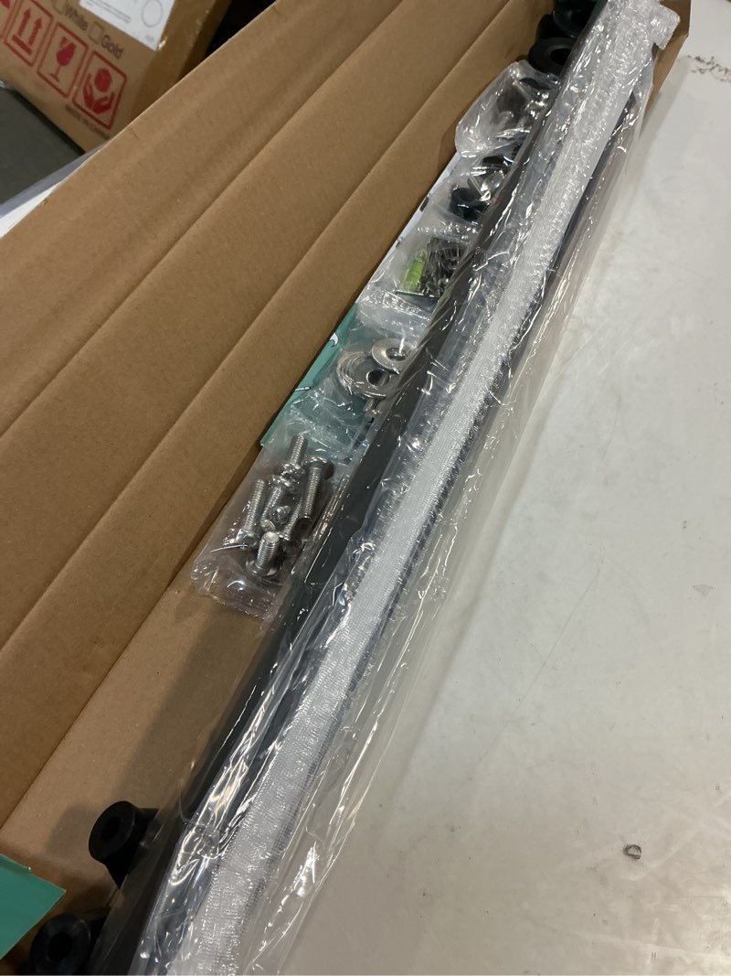 Condition photo showing Good Condition for Studless TV Wall Mount for 32-75 inch TVs, No Stud Drywall TV Bracket Holds up to 150 lbs, Low Profile, No Drill, Easy to Install for Bedroom Living Room, Bubble Level Included