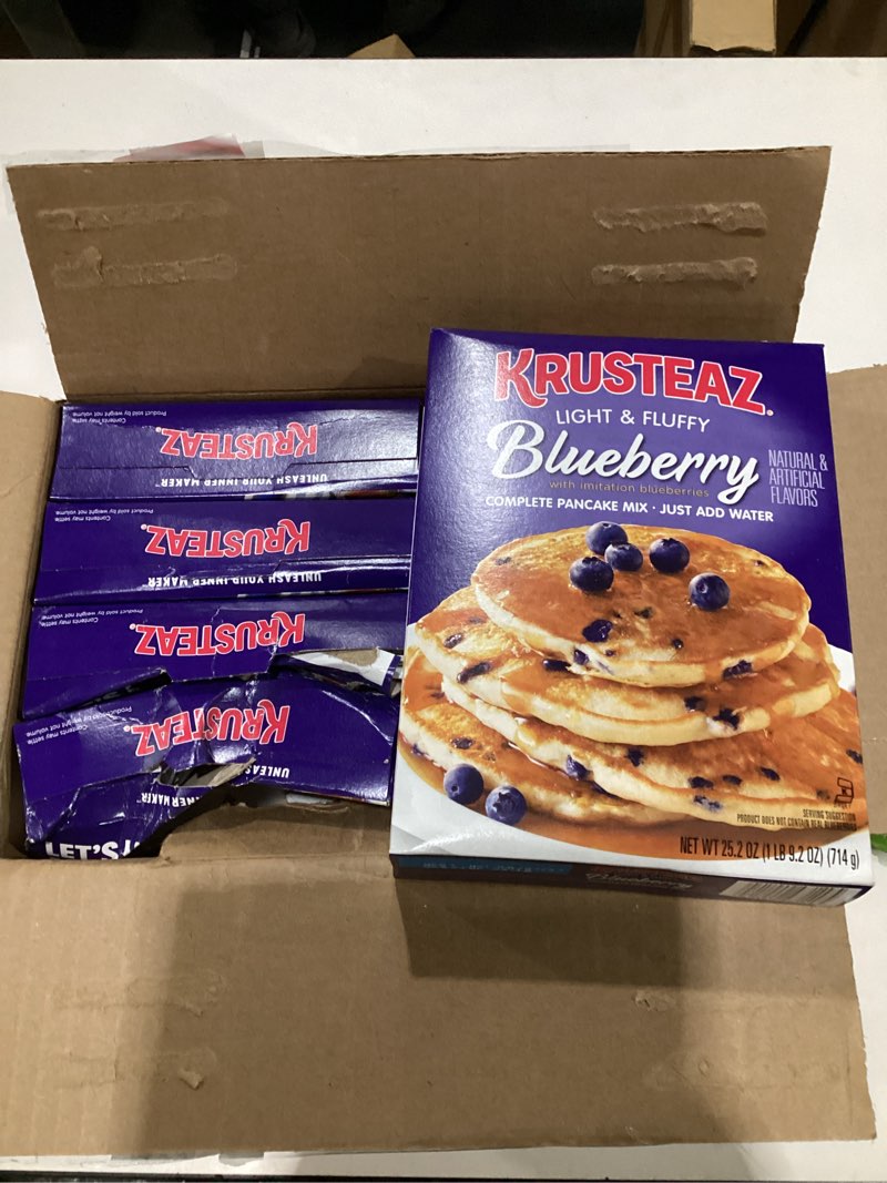 Condition photo showing As Is for Krusteaz Complete Blueberry Pancake Mix, 25.2 Oz (Pack of 8) Blueberry 25.2 Ounce (Pack of 8) BOX DAMAGED BEST BY 08/07/27