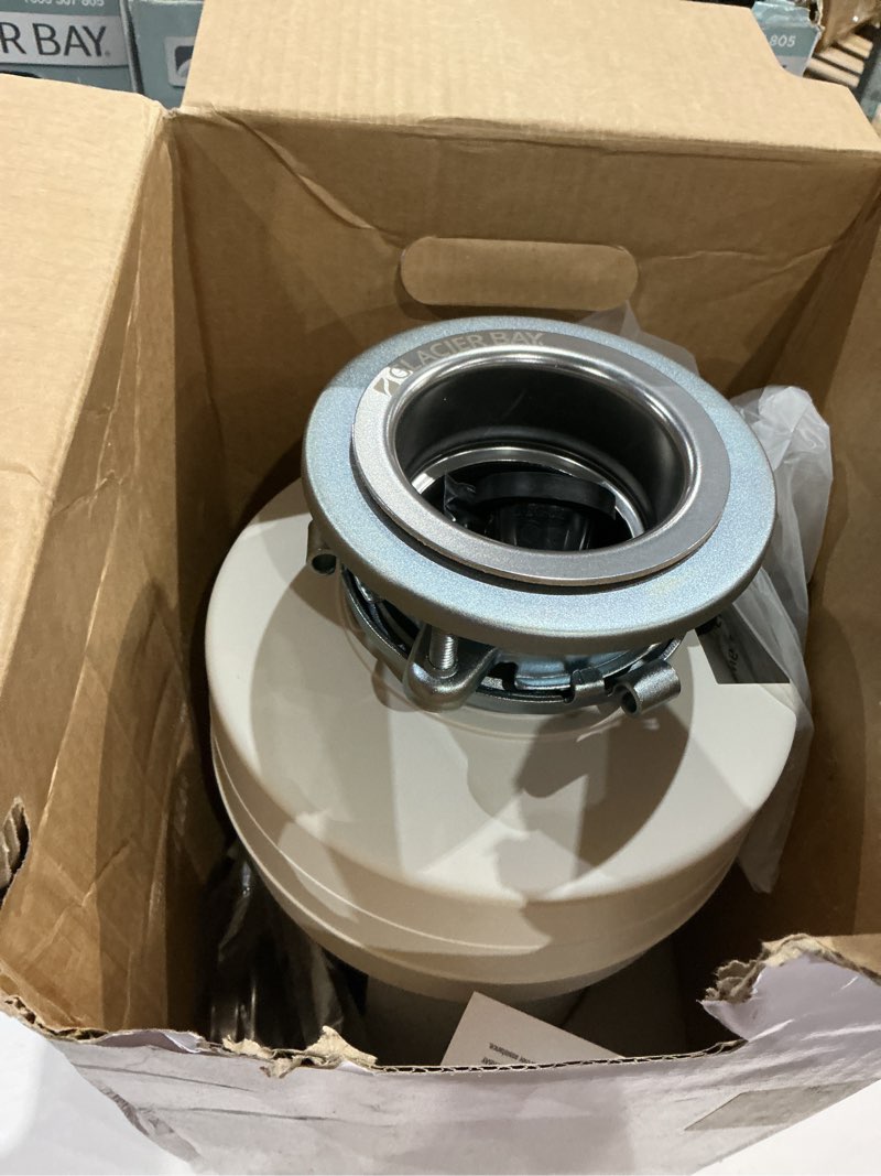 Condition photo showing As Is for turbo grind premier 3/4 hp continuous feed garbage disposal with power cord