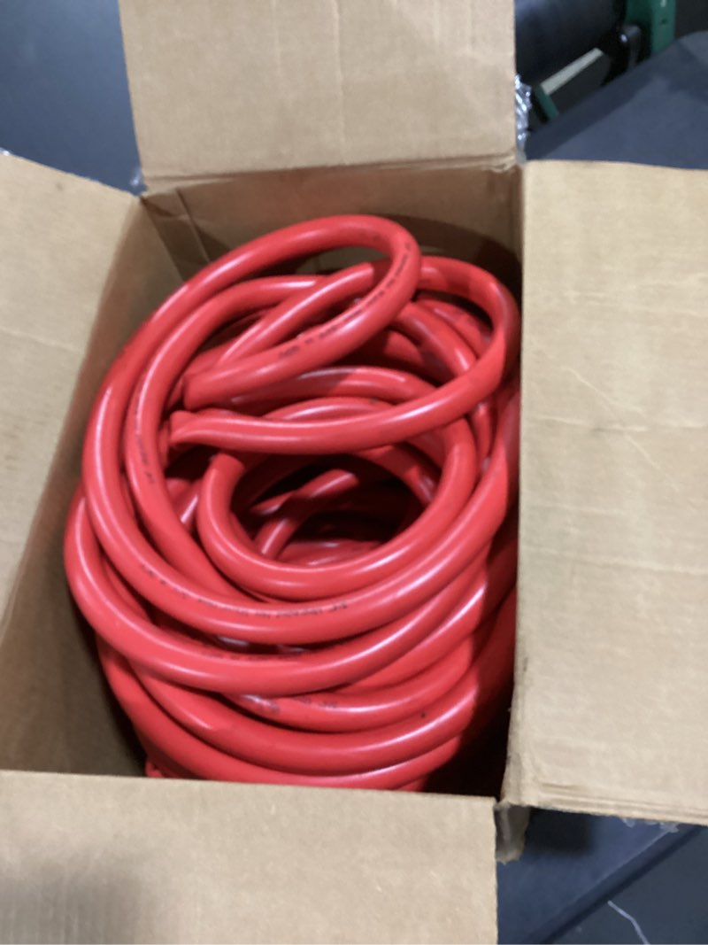 Condition photo showing As Is for kink control contractor grade hose with high burst strength, spring coil and crush resistant couplings, made in the usa 3/4 x 50 ft