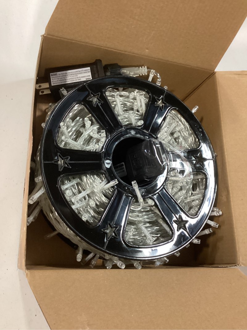 Condition photo showing Good Condition for JMEXSUSS Christmas Lights, 8 Modes Waterproof Christmas Light Outdoor Plug in, Clear Wire String Lights Indoor Bedroom 500LED White 163ft White 500 LED