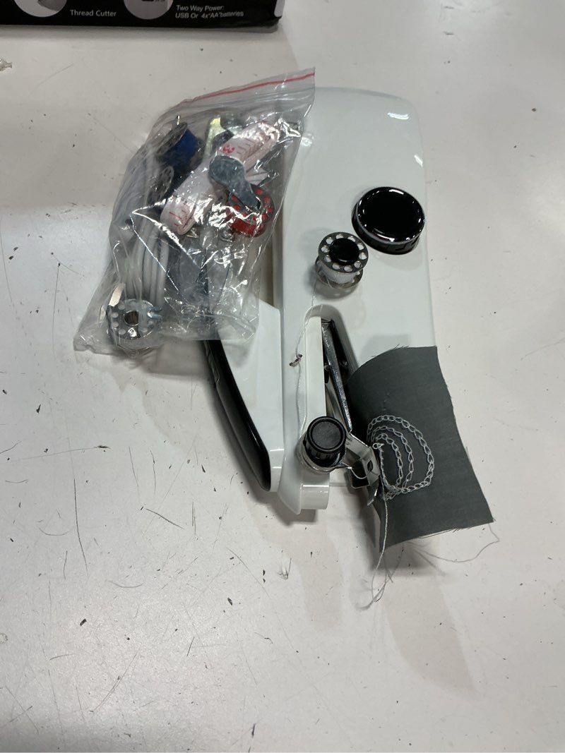 Condition photo showing As Is for handheld sewing machine, easy to use portable electric mini sewing machines for beginners with two speeds, with complete accessories kit, suitable for home, travel and diy(black)