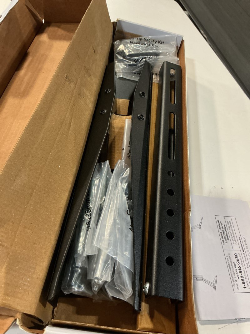 Condition photo showing As Is for onn tabletop tv stand for 37" to 70" tvs, holds up to 110 lbs, black- metal legs for tabletop