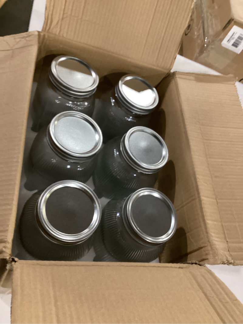 Condition photo showing Good Condition for 6 glass jars 