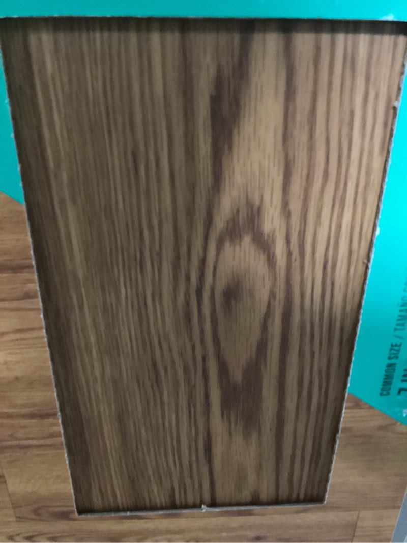 Condition photo showing As Is for STAINMASTER PetProtect Honeycomb 20-mil x 7-in W x 48-in L Waterproof Luxury Vinyl Plank Flooring