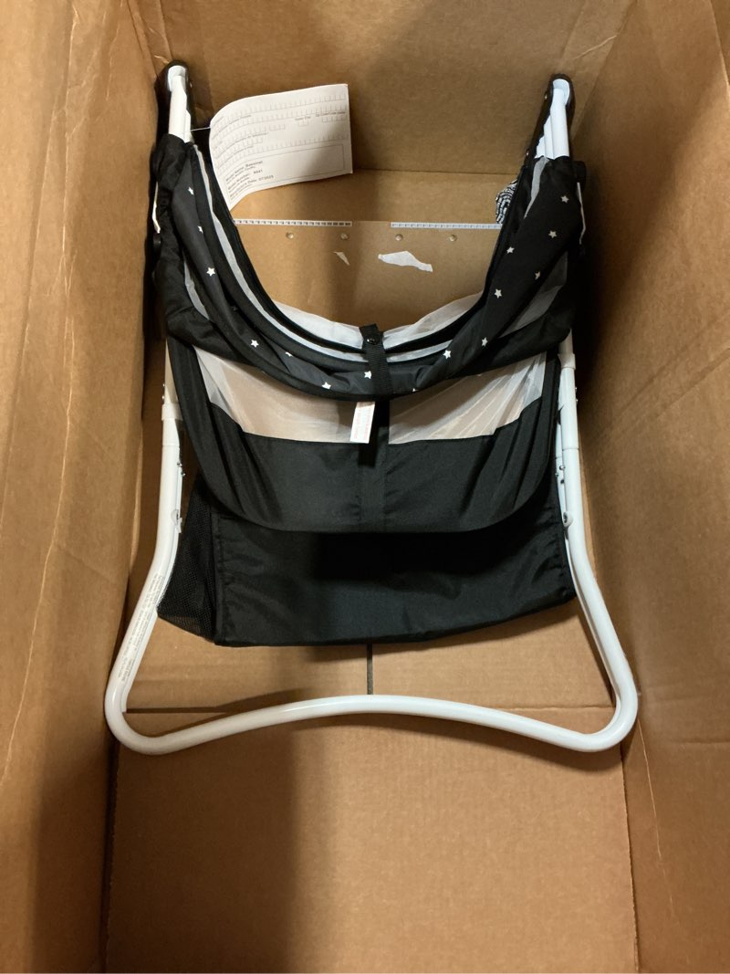 Condition photo showing As Is for dream on me karley bassinet, award winner lightweight travel baby bassinet, foldable bedside sleeper, adjustable double canopy, spacious design, soft fabric, storage basket – black and white