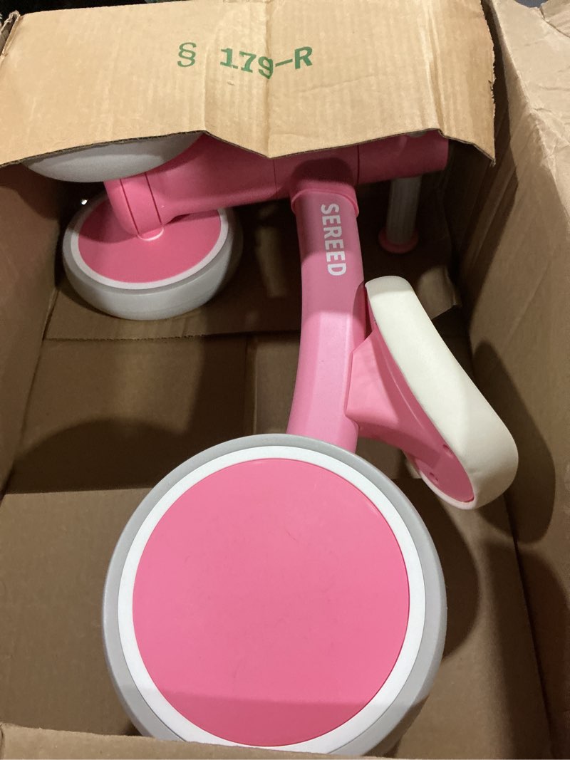 Condition photo showing As Is for SEREED Baby Balance Bike for 1 Year Old Boys Girls 12-24 Month Toddler Balance Bike, 4 Wheels Toddler First Bike, First Birthday Gifts Pink New