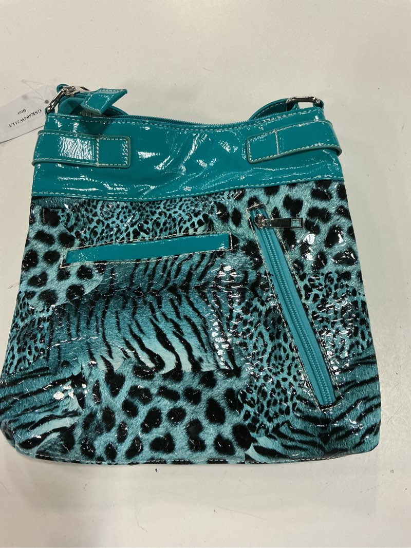 Condition photo showing Good Condition for studded concealed carry rhinestone skull crossbones accent handbag blue