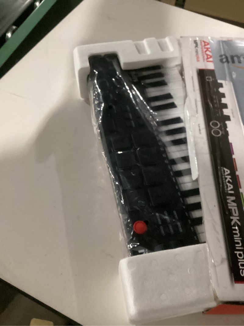 Condition photo showing Good Condition for Akai Professional MPK Mini IV USB-C MIDI Keyboard Controller for Beginners and Producers - MPC Drum Pads, 360° Knobs, Pitch and Mod Wheels, Production Software, Native Instruments Sound Package, Black