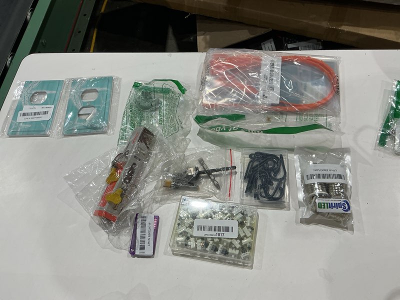 Condition photo showing As Is for assorted lot of electronics (headphones, small gadgets, headsets, etc.) 