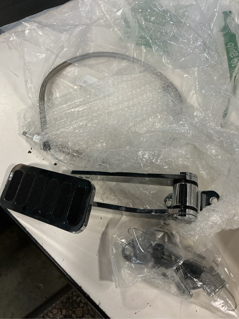 Condition photo showing As Is for universal polished aluminum throttle pedal, 2" x 4-1/2", includes stainless steel braided 36" throttle cable kit with 24" sleeve and cable & carb bracket