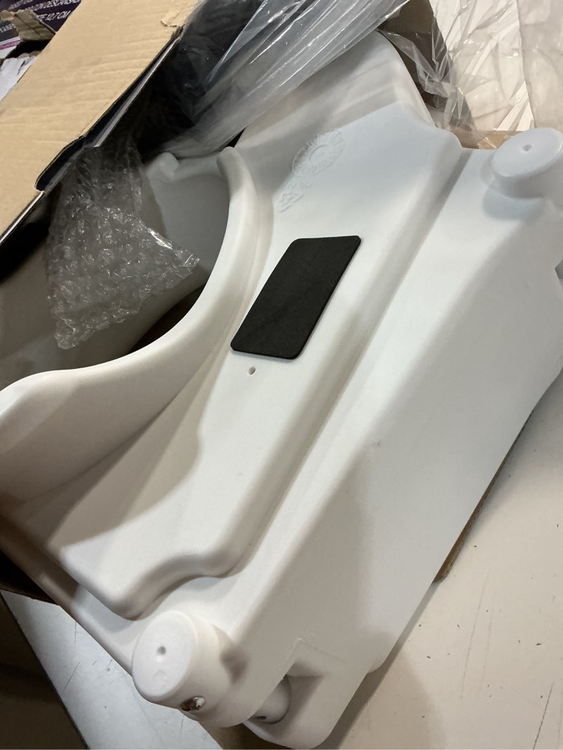 Condition photo showing As Is for bath safetyraised toilet seat product description: elev.toilet seat w/ remarms,rtl,1 ea