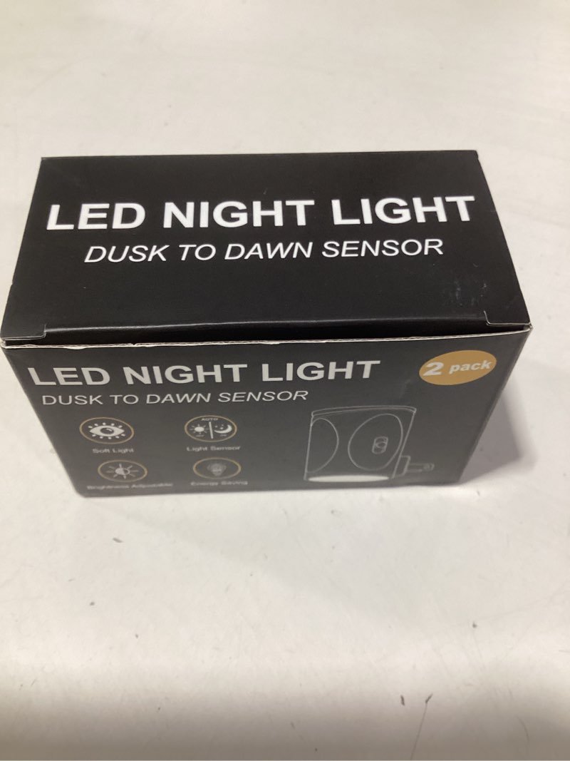 Condition photo showing New/Like New for briignite night lights plug into wall, modern led night light plug in, dusk to dawn sensor, soft white 3000k, 0-100lm adjustable brightness, dimmable nightlight for hallway, bedroom, stairway, 2 pack black-3000k 2 pack