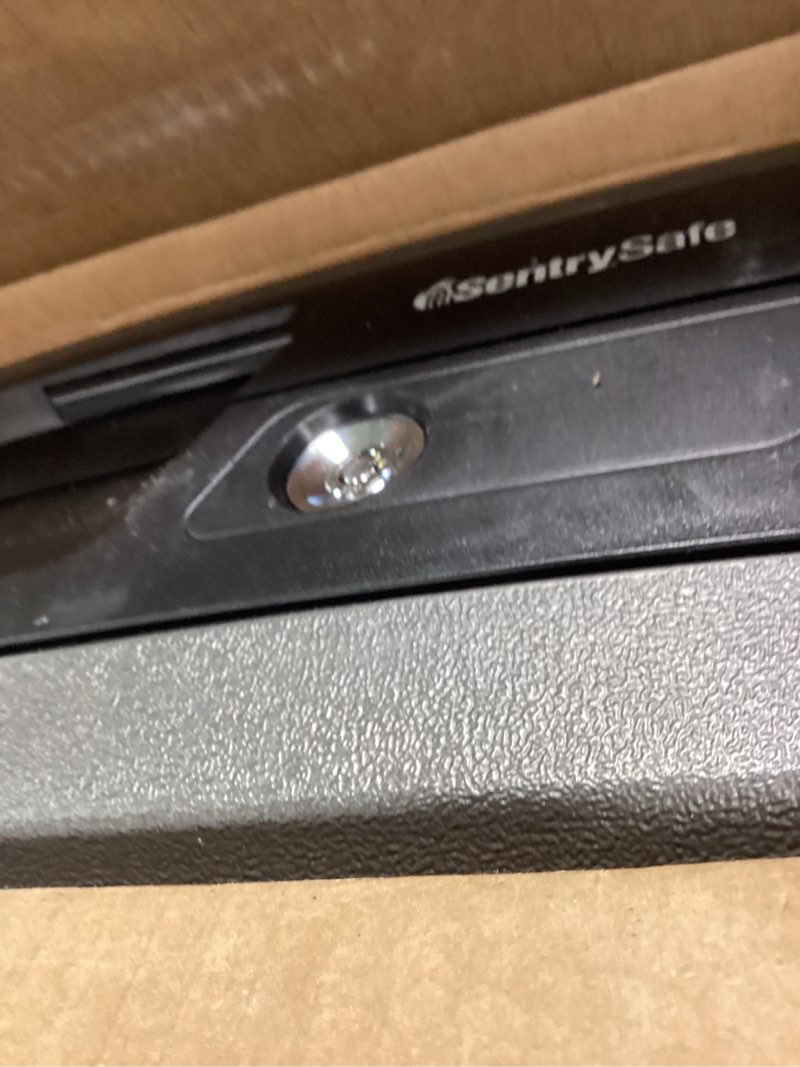 Condition photo showing Good Condition for SentrySafe Fireproof and Waterproof Safe Box with Key Lock, Fire and Water Chest Safe for Valuables, 0.36 Cubic Feet, 7.6 x 16.5 x 14.8 Inches, CHW30220